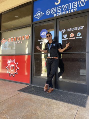Ashim Osmani stands in front of his business, Corview Security